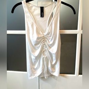 Bobbi white winched tank top in white. Size M. Adjustable with cinching.